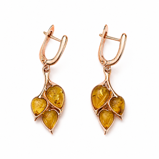 Natural Baltic amber jewelry in honey, cognac and green tones by Amber Haus Jewelry
