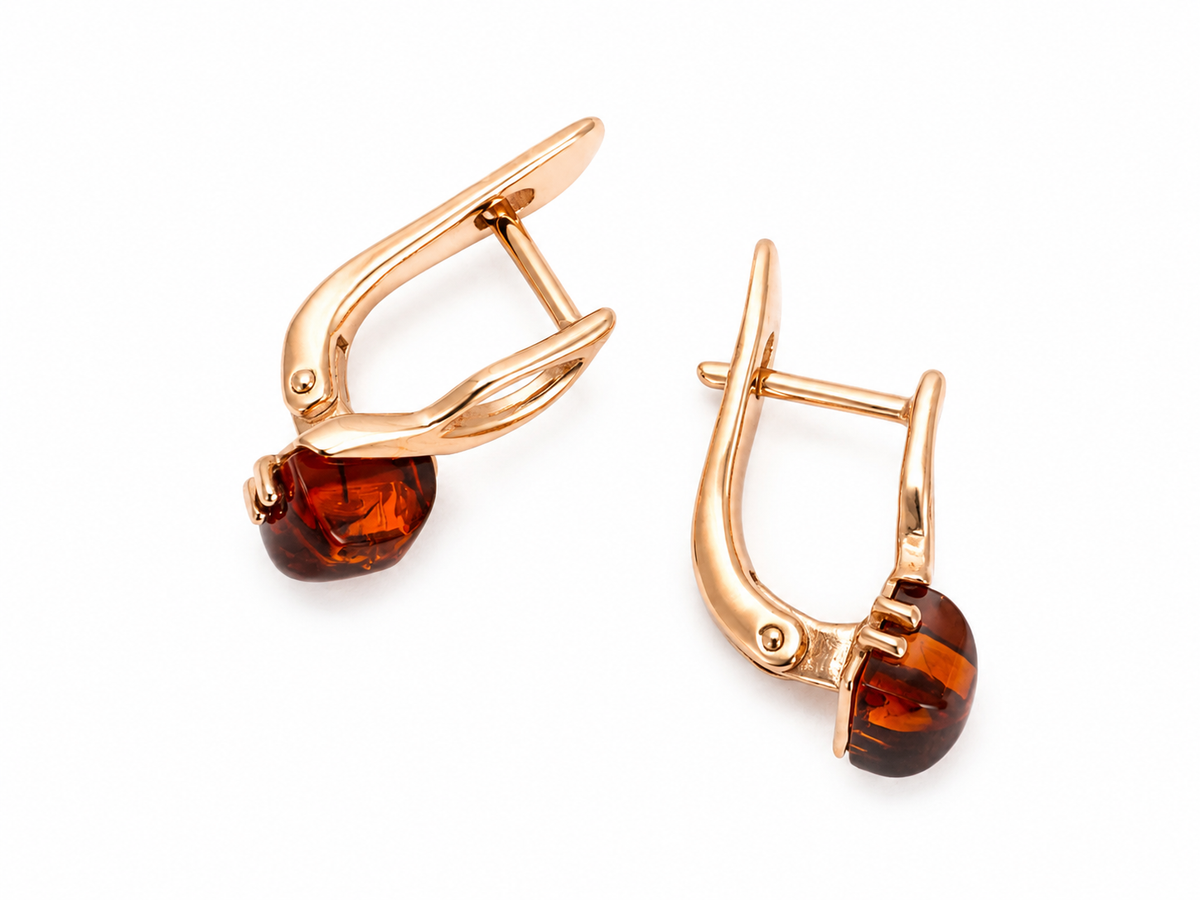 Faceted cognac Baltic amber drop earrings in 925 sterling silver with 14K rose gold plated finish